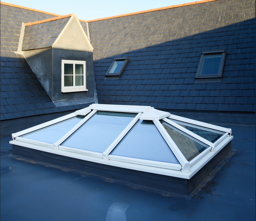 Modern slim-frame roof lantern flooding an extension with natural light