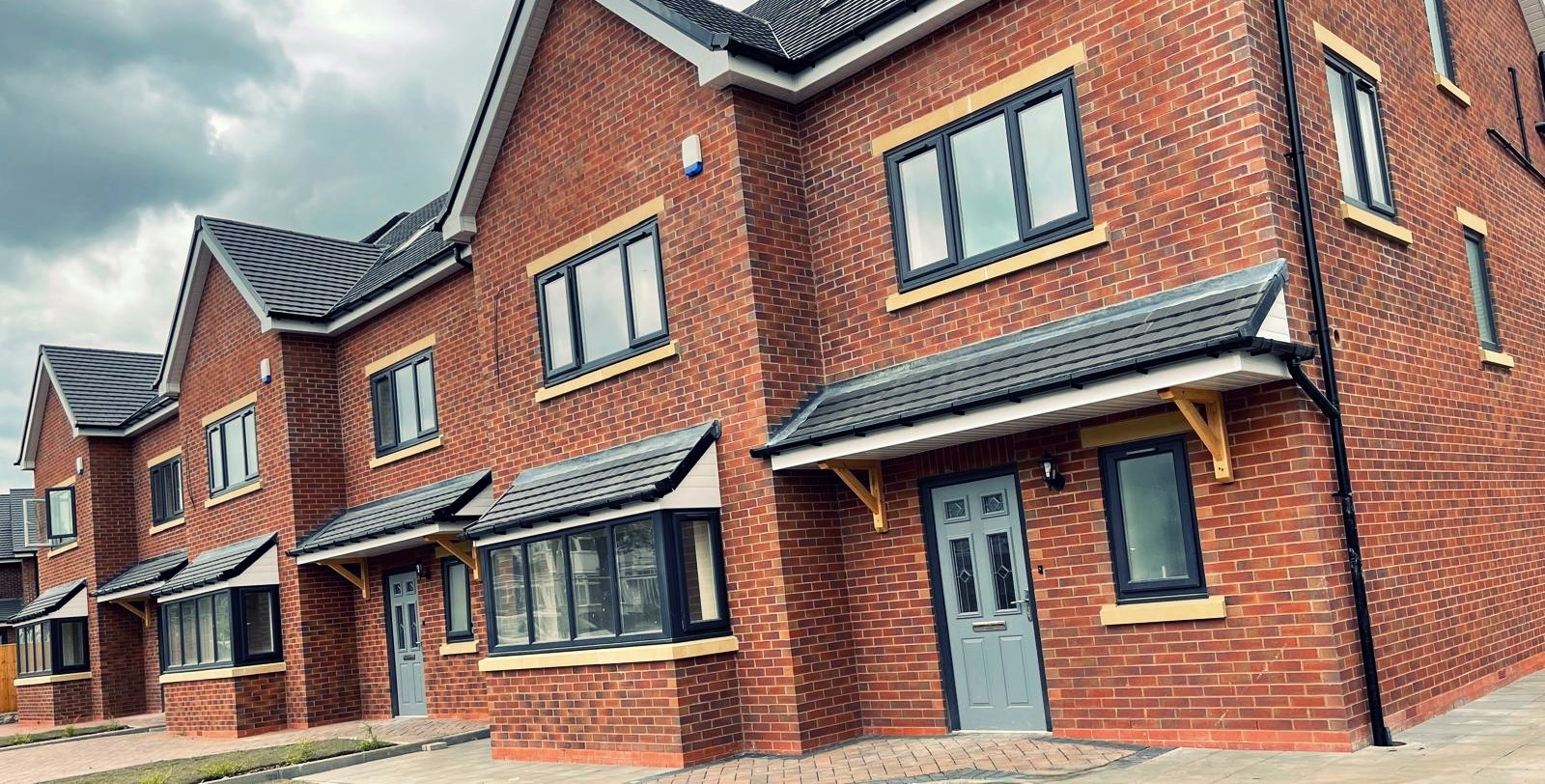 Installer on-site fitting a new frame with care and accuracy