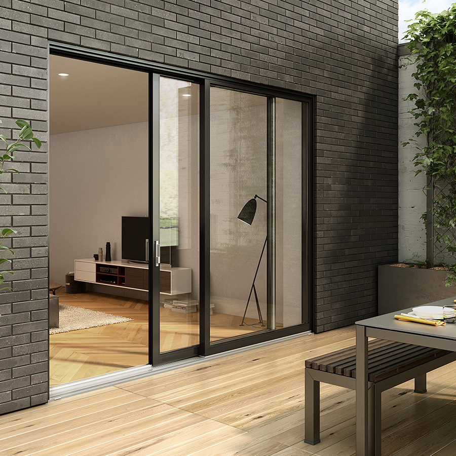 Classic white patio sliding doors opening onto a garden patio, blending indoor and outdoor living