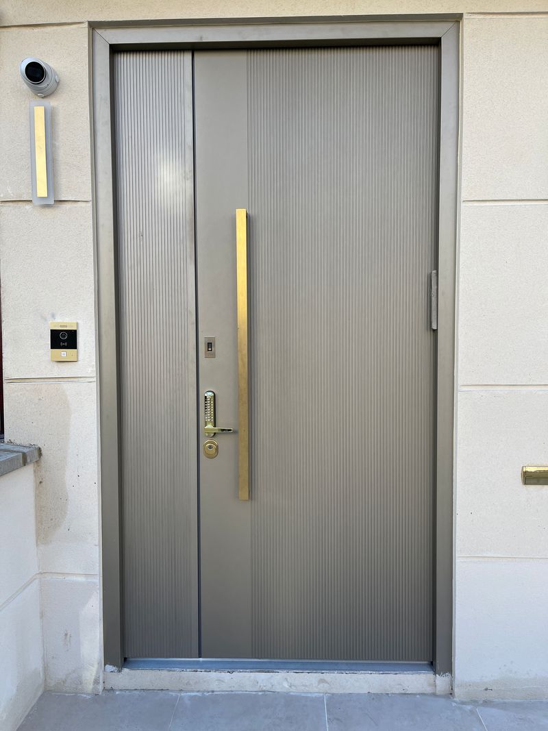 High security entrance door shown sealed against the threshold to block cold air and noise