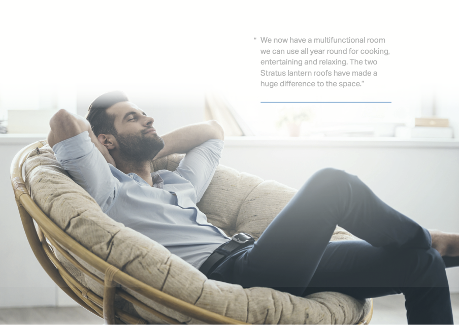 Modern kitchen extension with slim-frame aluminium roof lantern letting in natural daylight